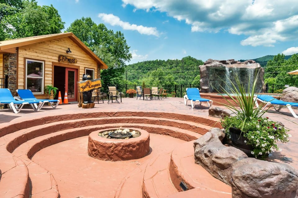 SmokiesBoutiqueCabins would love to host you at Dolly's Cute Cabin! 4 Suites with Private Bathrooms - Hot Tub, Fire Pit, Game Room, Resort Pool open Memorial Day through Labor Day! Cabin in Pittman Center