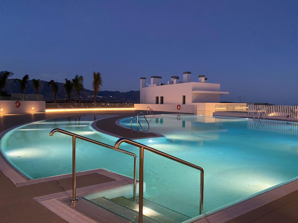 Property building, Swimming pool, Sunset