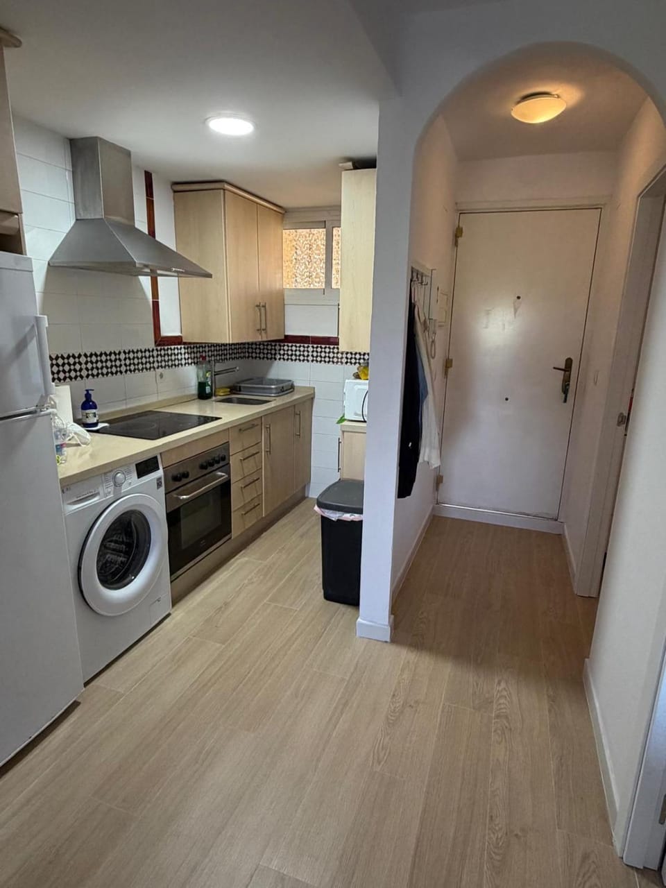Kitchen or kitchenette, washing machine