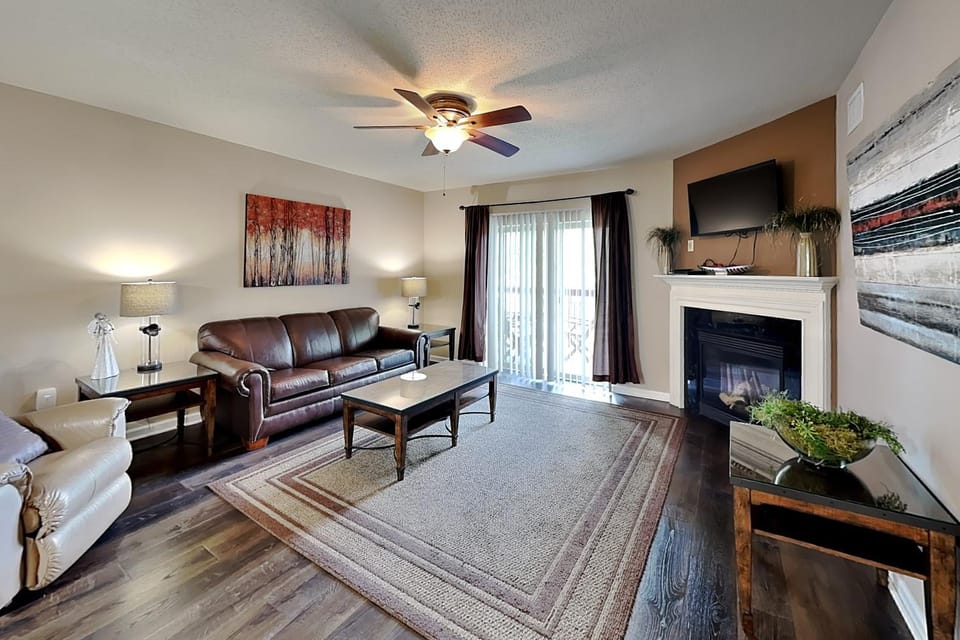 TV and multimedia, Living room, Seating area, fireplace, furniture, air conditioner