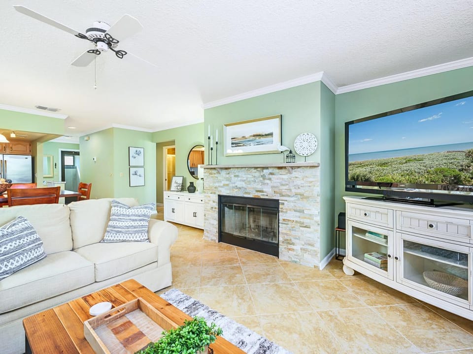 TV and multimedia, Living room, Seating area, Sea view, fireplace, furniture