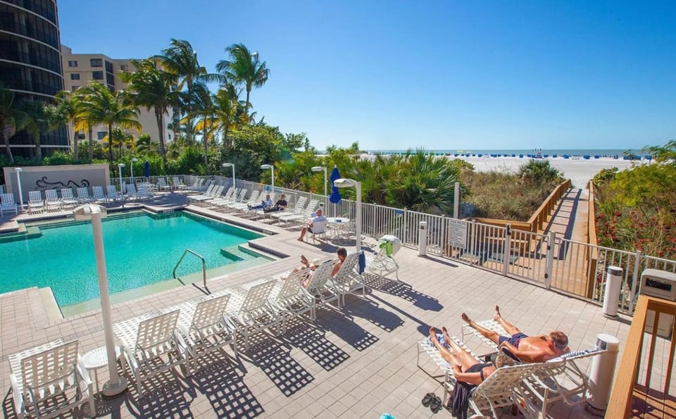 Property building, Patio, Garden, Beach, Guests, Swimming pool
