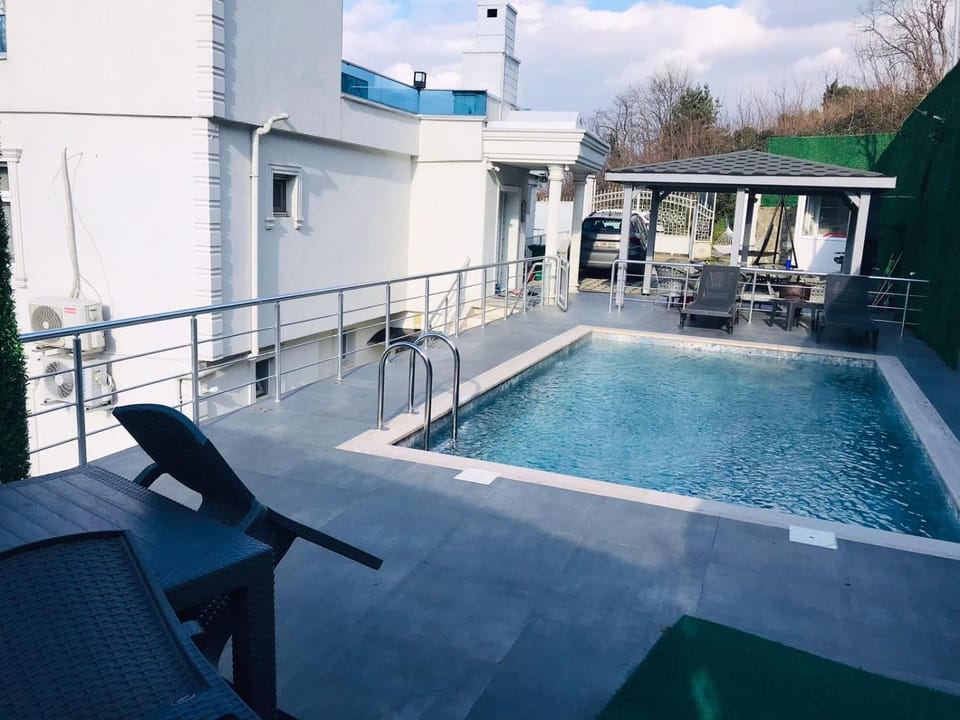 Property building, Patio, Day, Natural landscape, View (from property/room), Balcony/Terrace, Pool view, Swimming pool, sunbed