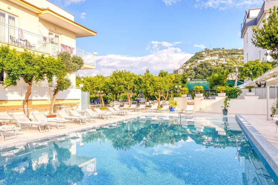 Property building, Day, Natural landscape, Swimming pool, Swimming pool, sunbed