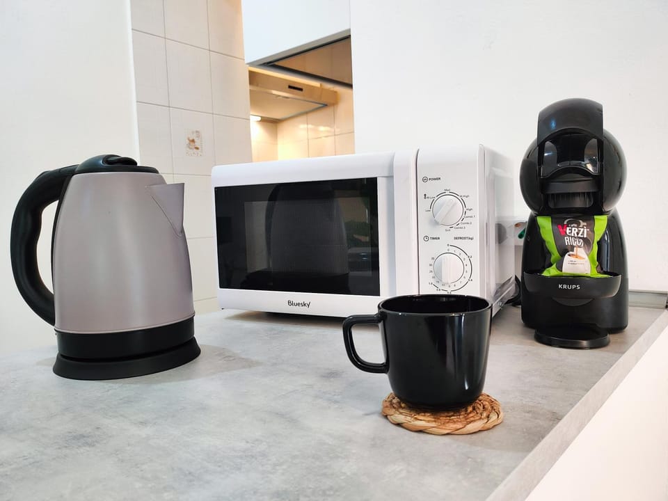 Kitchen or kitchenette, microwave