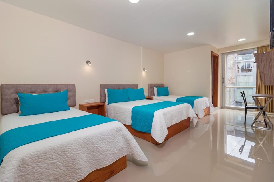 Hostal Plaza by Elvita Bed and Breakfast in Banos