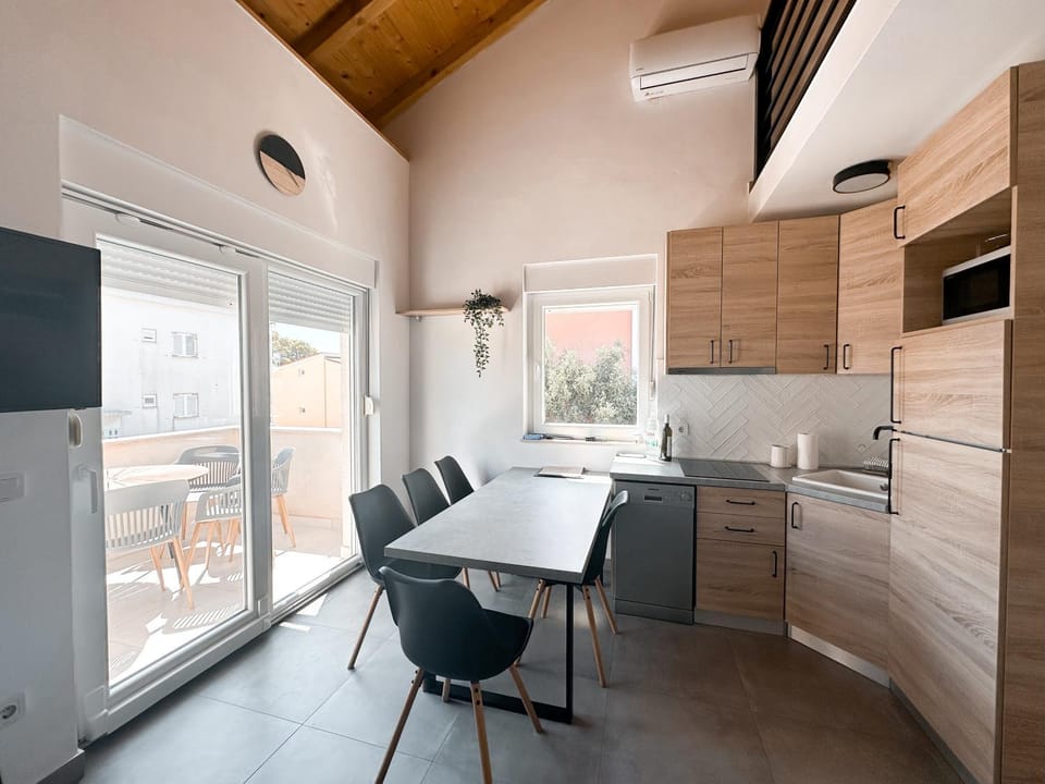 Living room, Dining area, dishwasher, microwave, stove, kitchen