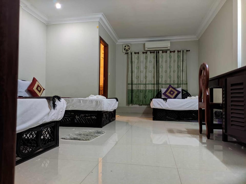Photo of the whole room, Bedroom, towels, air conditioner