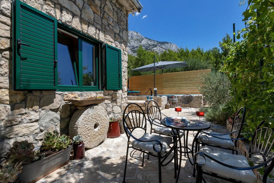 Property building, Patio, Day, Natural landscape, View (from property/room), Seating area