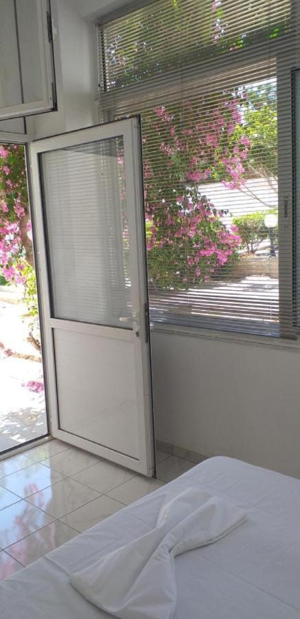 white and blue,finikas syros Apartment in Decentralized Administration of the Aegean