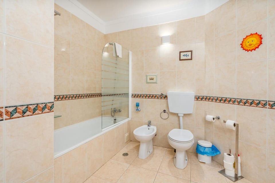 Toilet, Property building, People, Bathroom, View (from property/room), Decorative detail, Decorative detail, On site, Guests, towels