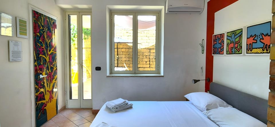 Bed, towels, air conditioner