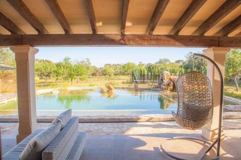 Property building, Living room, Swimming pool