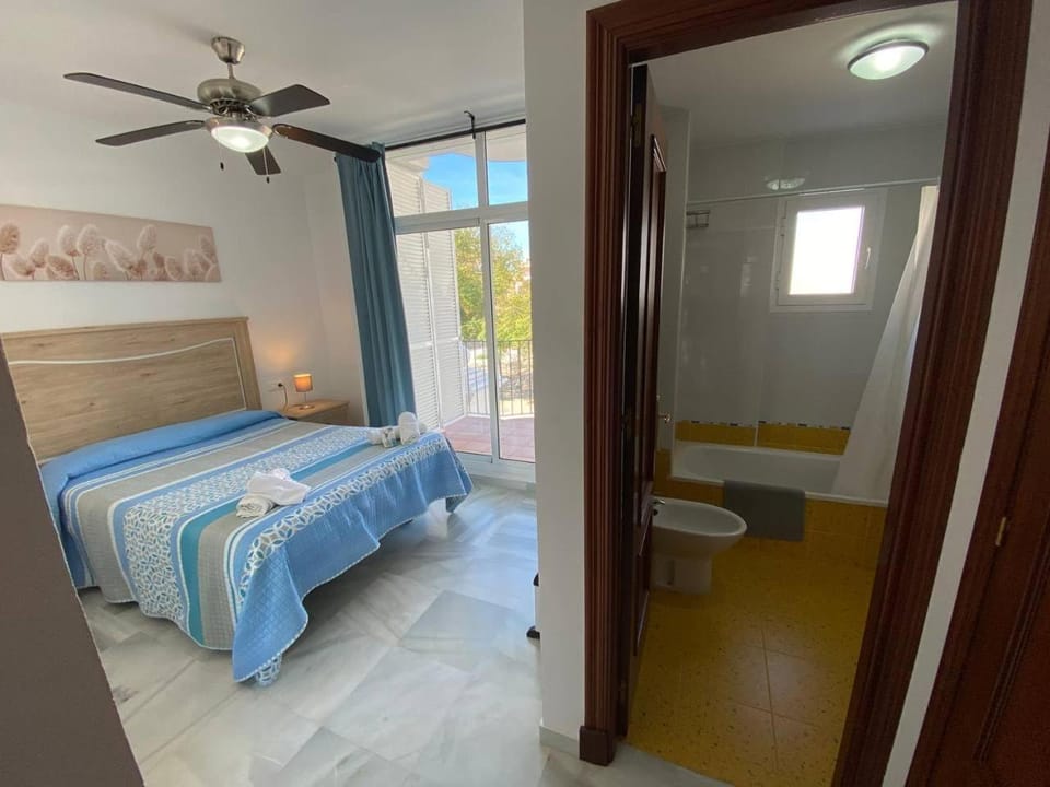 Shower, Toilet, Bed, Bathroom, Photo of the whole room, Bedroom, fireplace