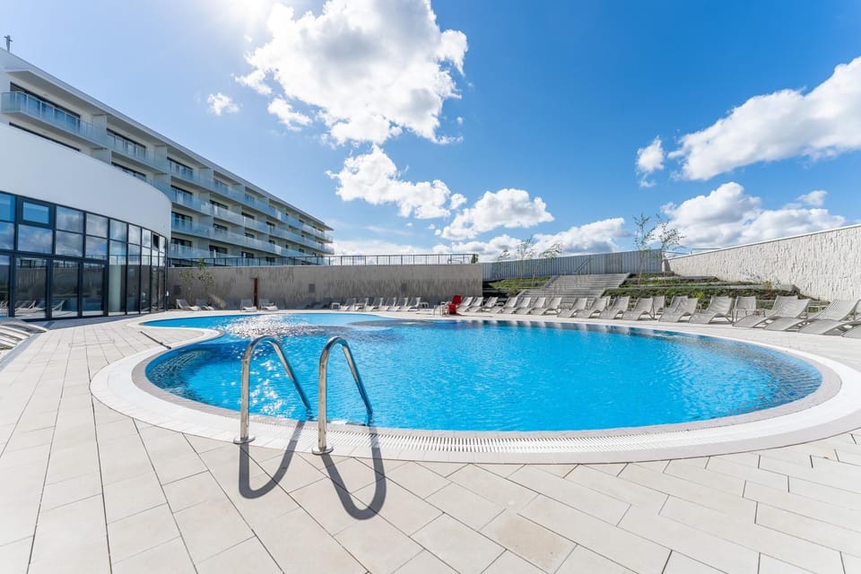 Property building, Day, Pool view, Swimming pool, sunbed