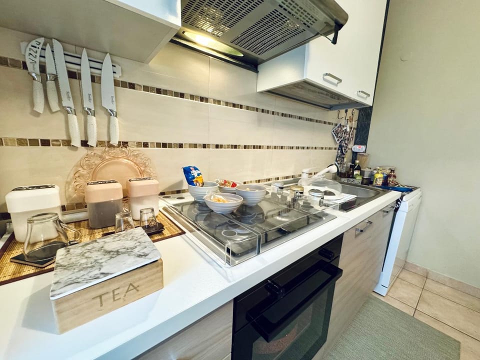 Kitchen or kitchenette, stove