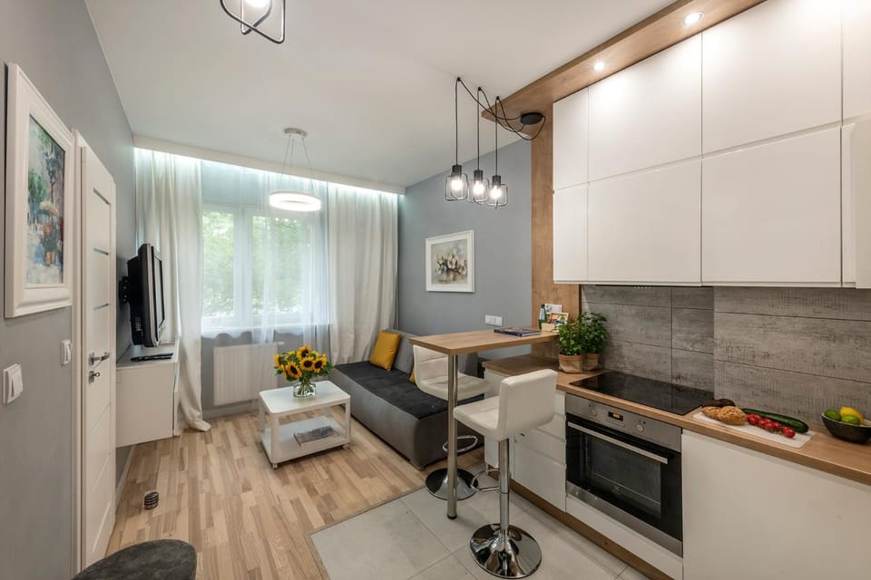 Kitchen or kitchenette, Living room, Seating area, Dining area