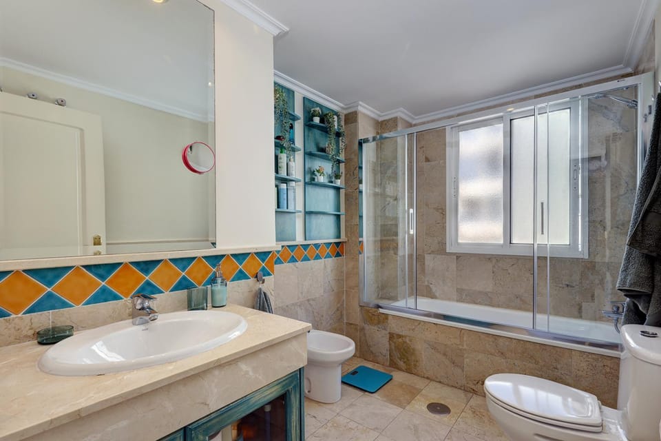 Bathroom, bidet, towels