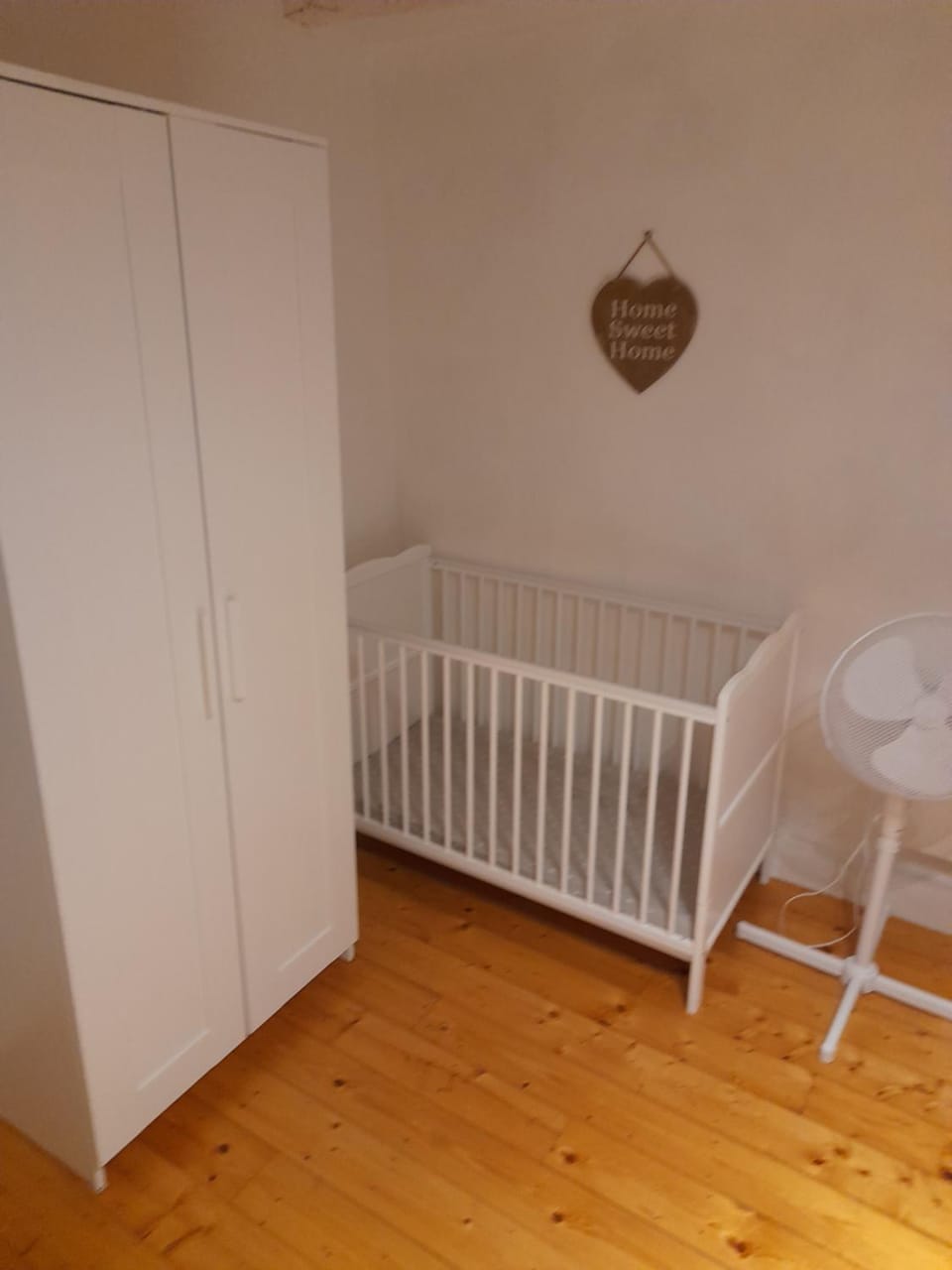 cot, wardrobe