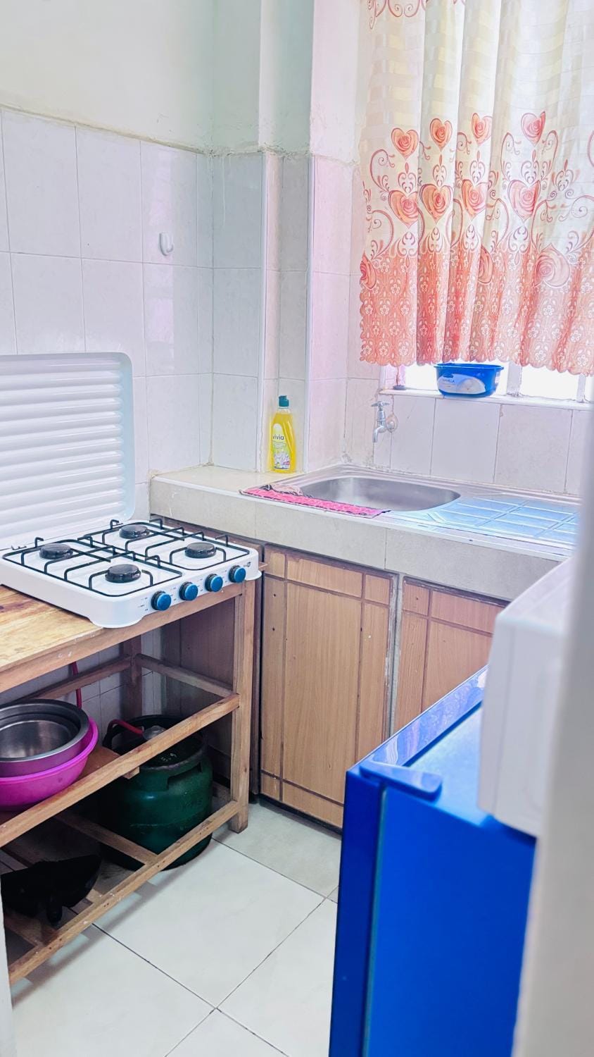 Kitchen or kitchenette, stove
