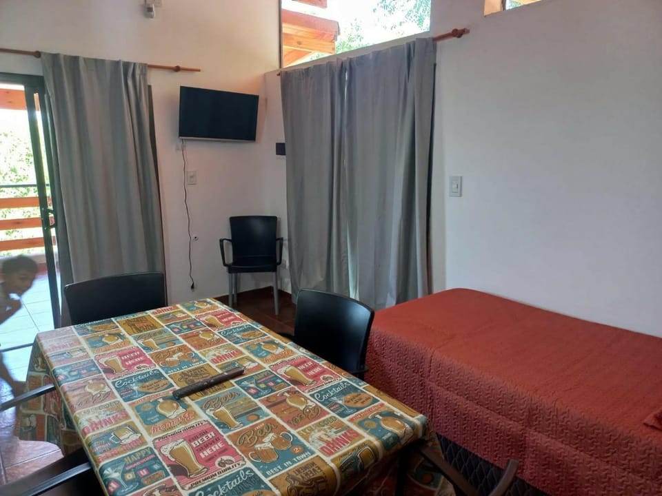 Bed, Living room, Seating area, Bedroom