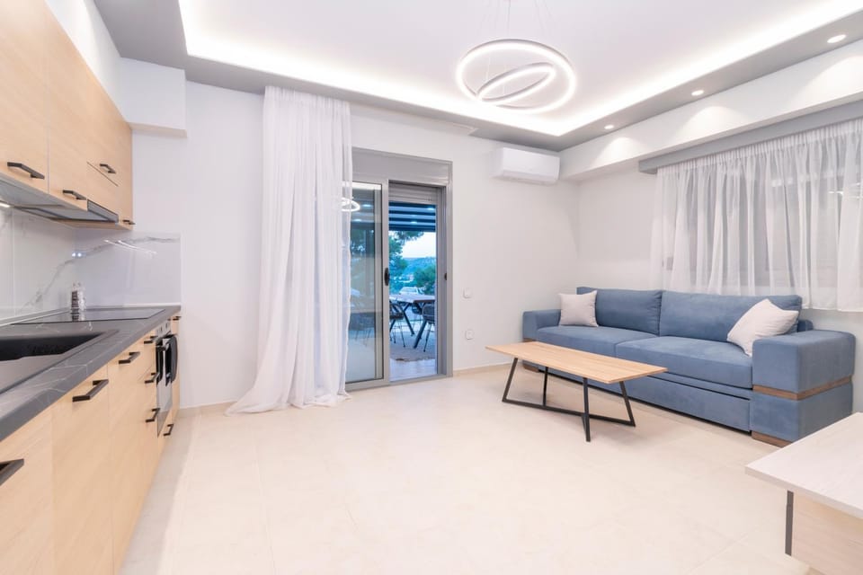 Kitchen or kitchenette, Living room, Seating area, Dining area