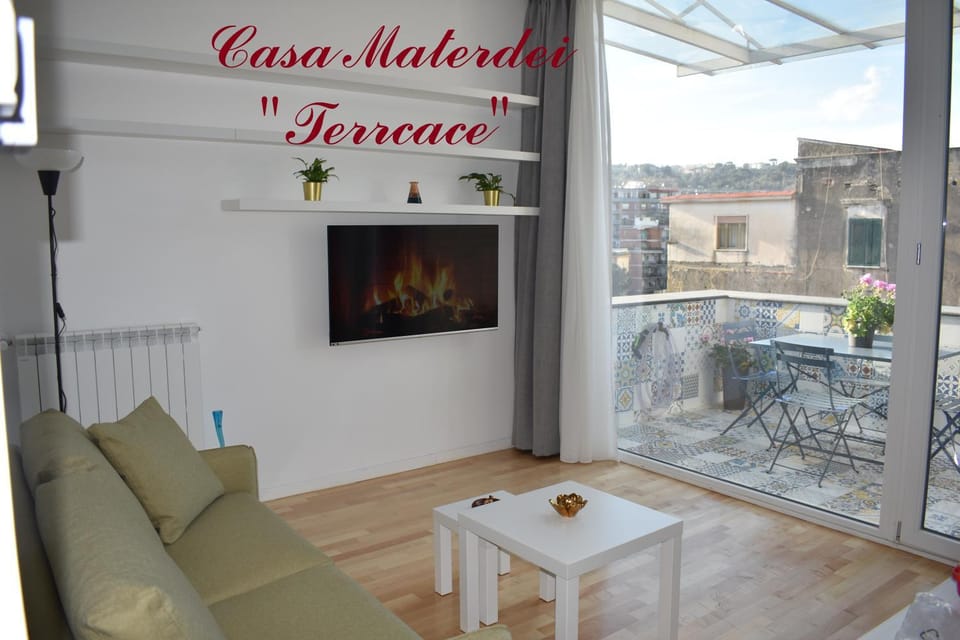 Property logo or sign, Property logo or sign, TV and multimedia, View (from property/room), Balcony/Terrace, Living room, City view, Inner courtyard view