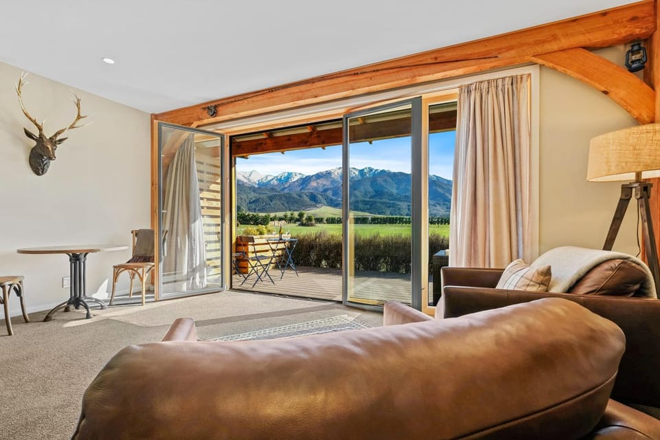 Bed, Living room, Seating area, Bedroom, Mountain view