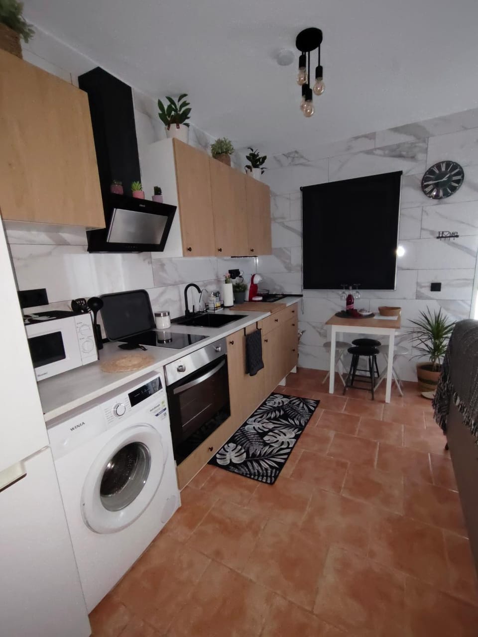 Kitchen or kitchenette, Dining area, oven, stove, toaster, washing machine