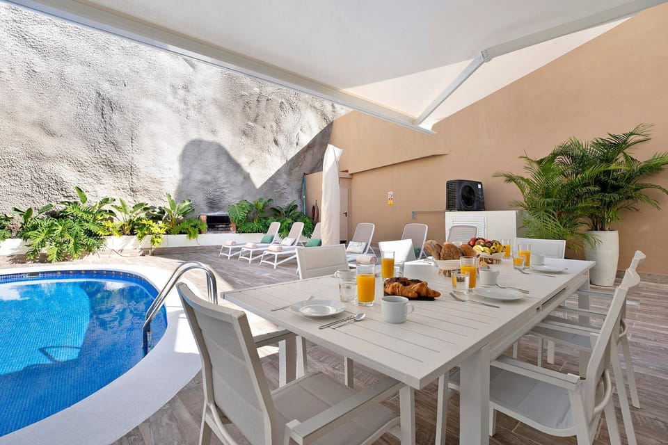 Property building, Living room, Swimming pool