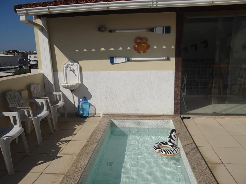Tudo a pé com conforto. Três quartos com cama de casal Apartment in Cabo Frio