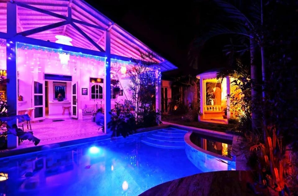 Patio, Night, Pool view, Swimming pool, sunbed