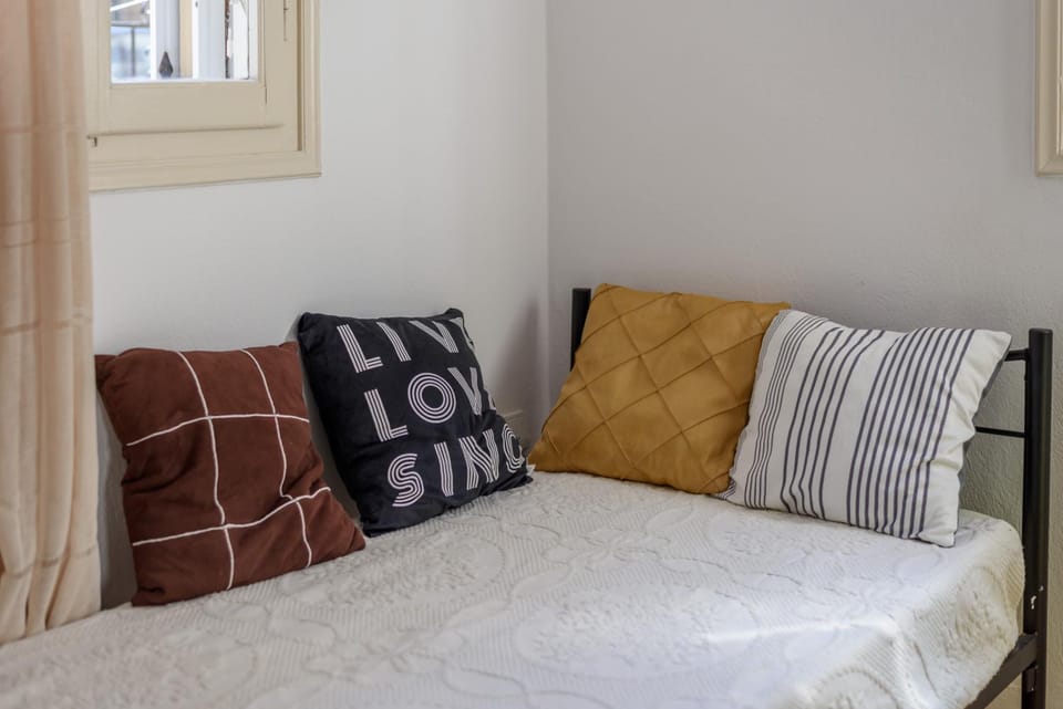 Bed, Living room, Seating area