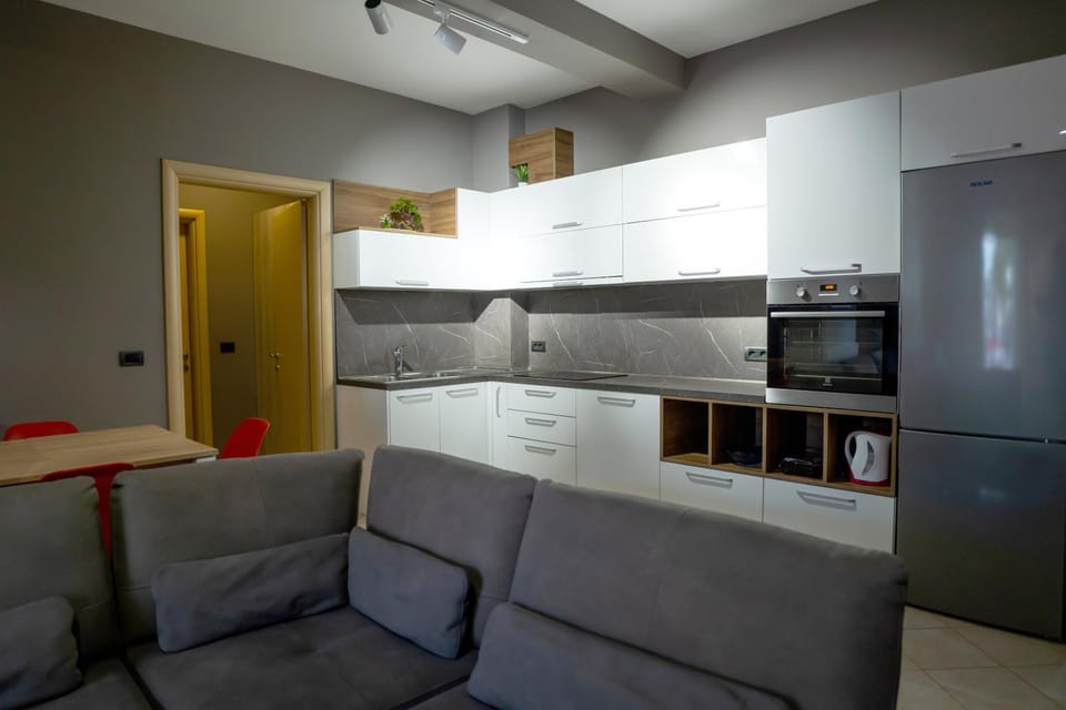 Kitchen or kitchenette, Living room, Seating area, Dining area