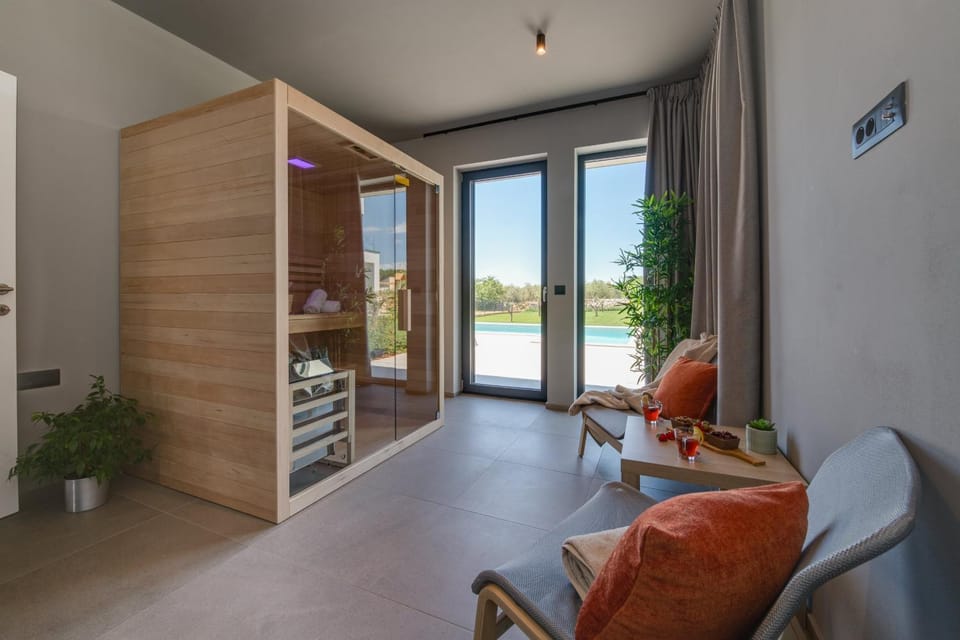 Villa Arestea near Pula with 35 m2 heated pool, sea view, wellness & kids playground Villa in Vodnjan