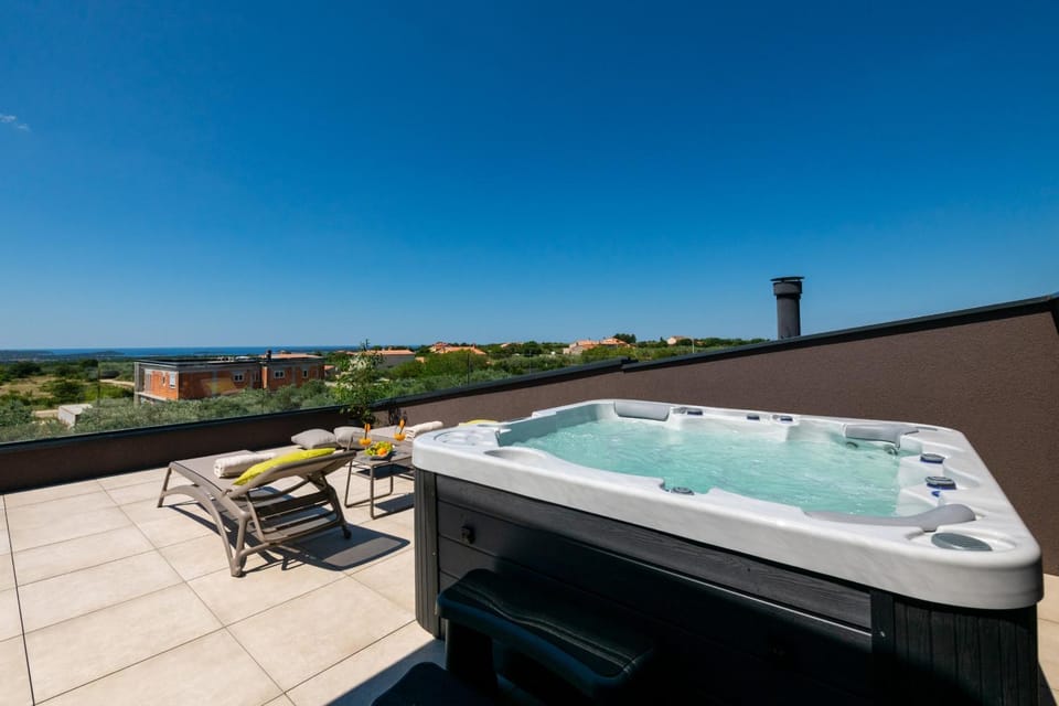 Villa Arestea near Pula with 35 m2 heated pool, sea view, wellness & kids playground Villa in Vodnjan