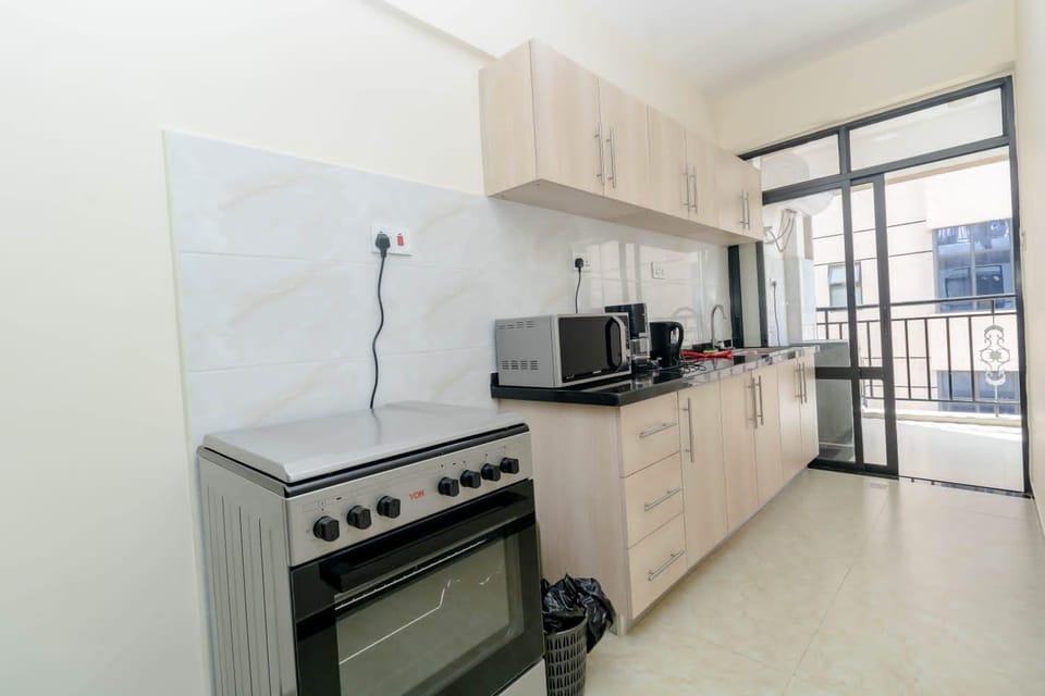 Kitchen or kitchenette, oven, stove