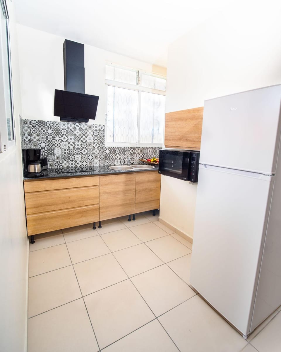 Kitchen or kitchenette, oven, stove