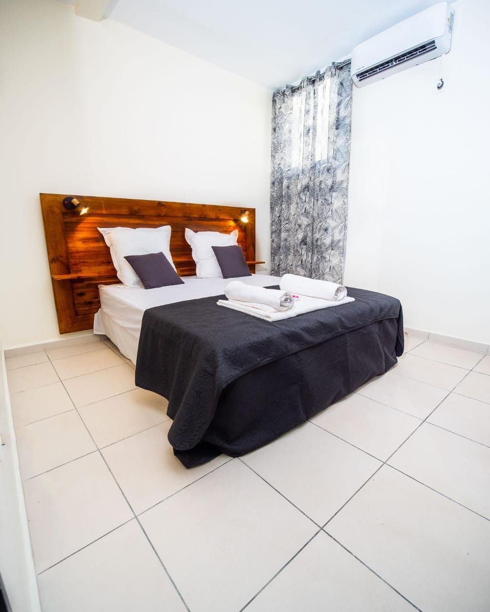Bed, Photo of the whole room, Bedroom, towels, air conditioner, air conditioner