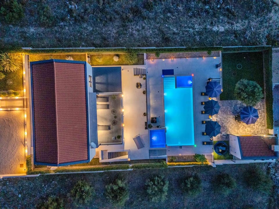 Property building, Patio, Night, Bird's eye view, Pool view, Swimming pool, sunbed