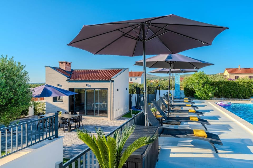 Property building, Patio, Spring, Day, Garden view, Pool view, Swimming pool, sunbed