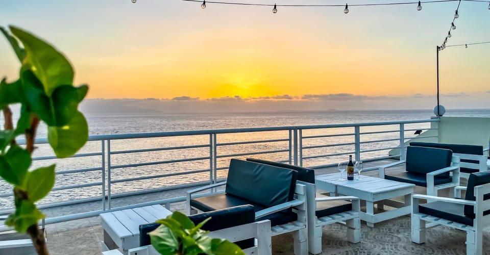 Natural landscape, View (from property/room), Balcony/Terrace, Balcony/Terrace, Seating area, Sea view, Sunset