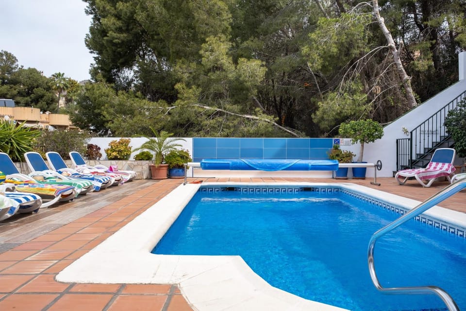 Property building, Living room, Swimming pool