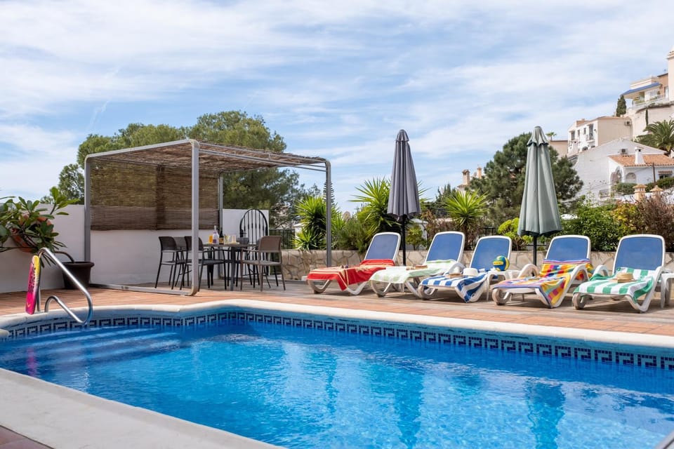Property building, Living room, Swimming pool