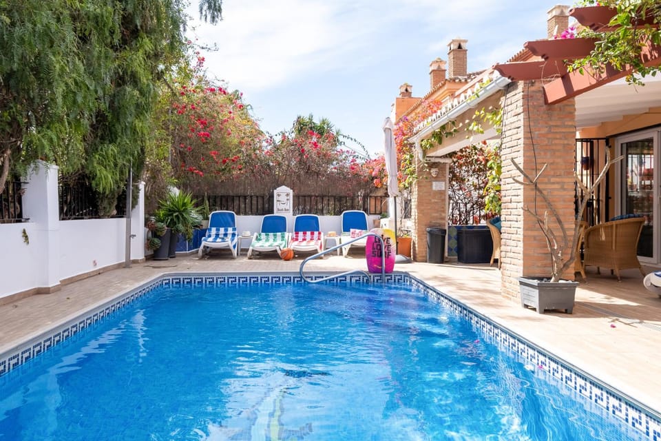 Property building, Living room, Swimming pool