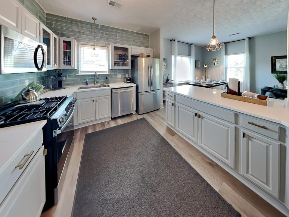 Kitchen or kitchenette, dishwasher, microwave, oven, stove, kitchen