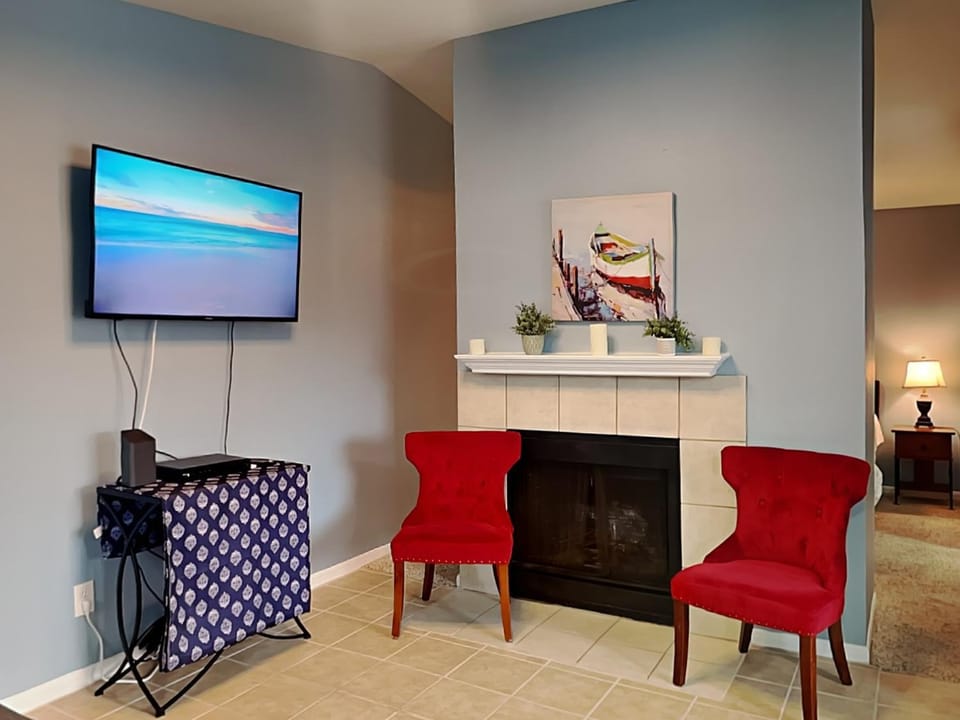 TV and multimedia, Living room, Seating area, fireplace, furniture