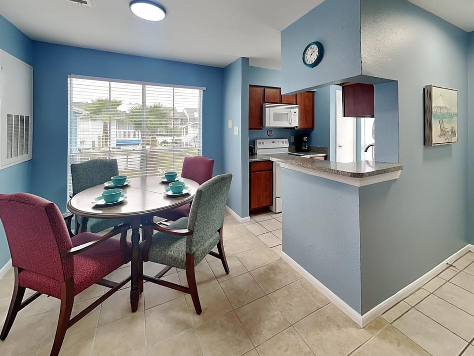 Kitchen or kitchenette, Dining area, furniture, microwave, oven, stove