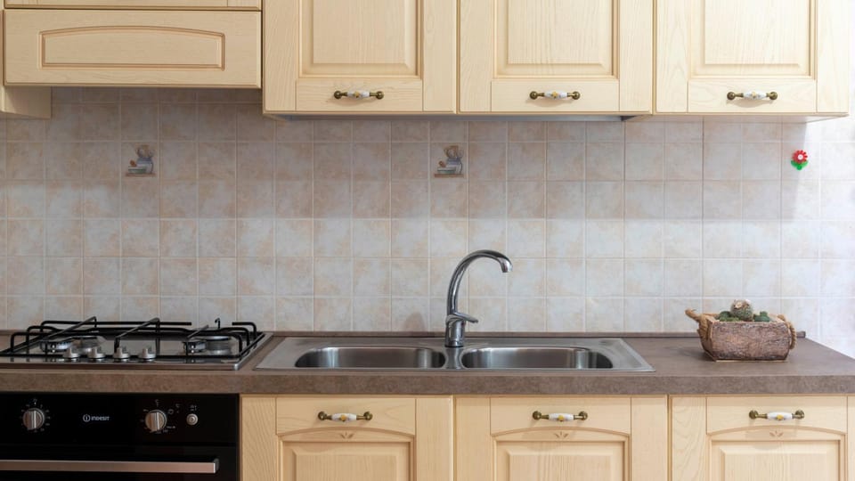 Kitchen or kitchenette, stove