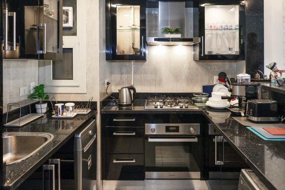 Lovely 2 bedroom duplex with a pool in front AUC Apartment in New Cairo City